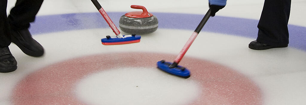 Sweeping the ice helps to speed up and smooth the ice for the curling stone.