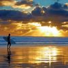 Surfing Muriwai, Auckland New Zealand.