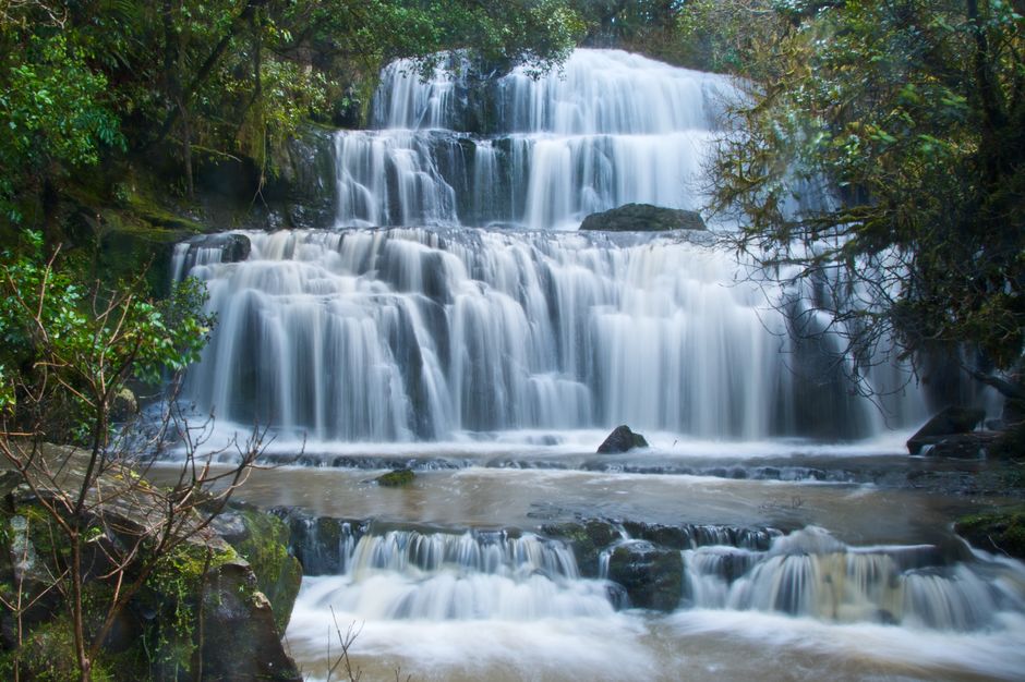 Marvel at the three-tiered waterfall in the Catlins