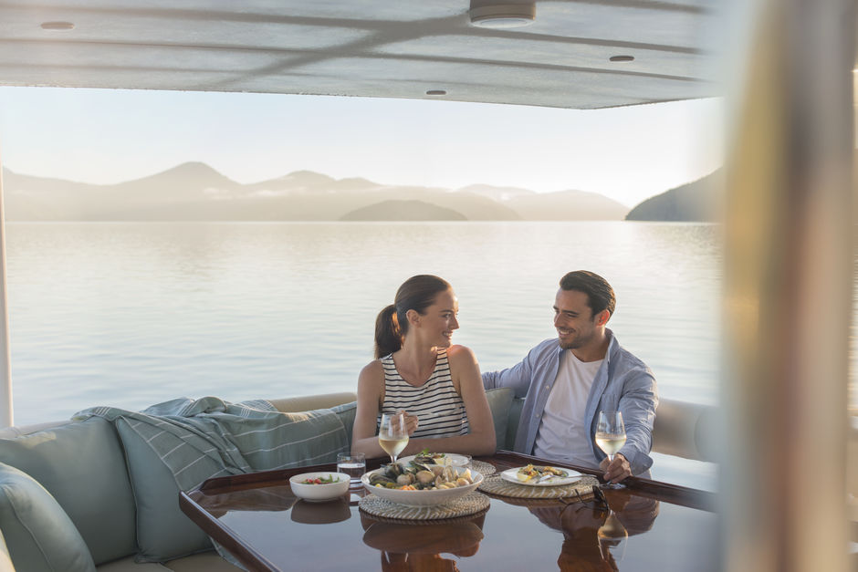 Enjoy Marlborough's crisp wines as you soak in the beautiful vistas of Queen Charlotte Sound on a cruise.