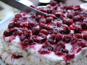 A Kiwi feast is incomplete without a classic pavlova - a meringue dessert topped with whipped cream, summer berries or kiwifruit.