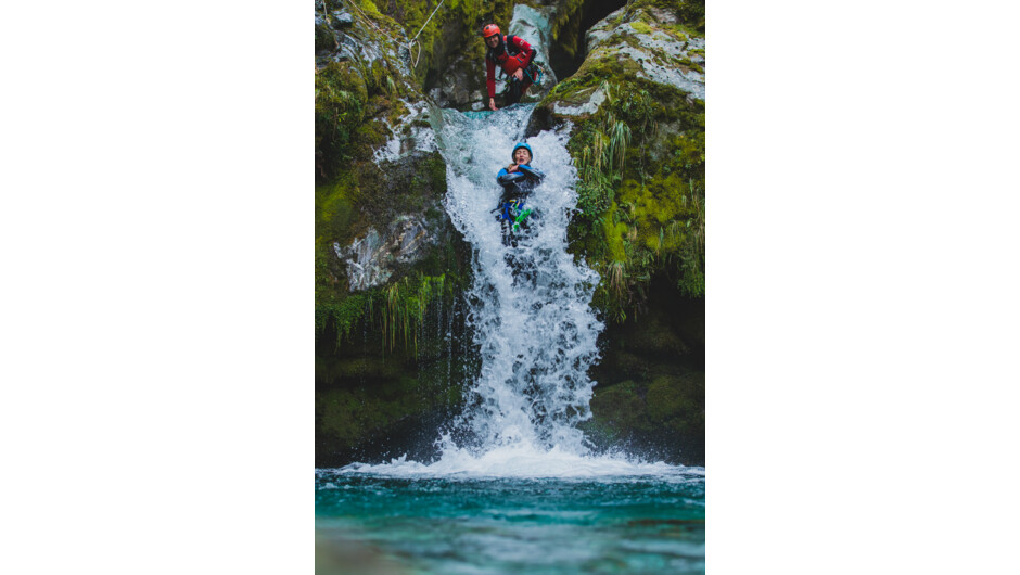 Sliding down waterfalls