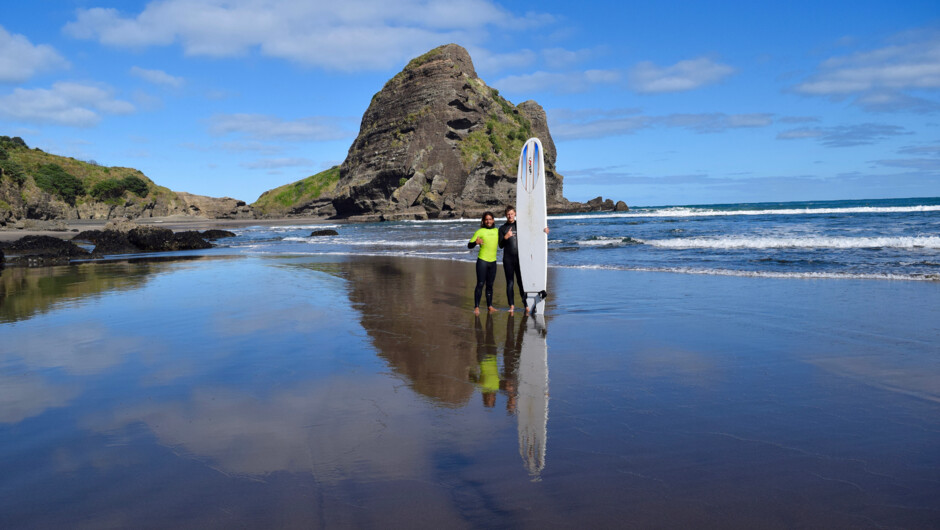 Surf coach and student