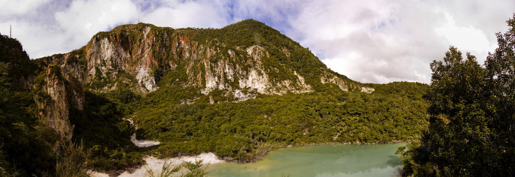 The Crater Lakes Walk offers great views of two volcanic craters set against a backdrop of bare brown, orange and red steaming cliffs.