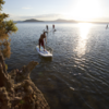 Paddleboarding as the sun rises over Lake Rotorua is magic.