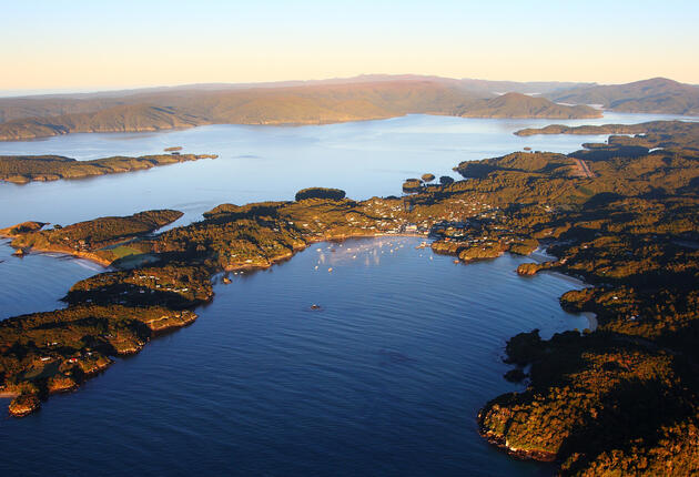 Visit Stewart Island, New Zealand, the third largest island also known as Rakiura. Explore the full experience of Stewart Island's wild beauty.