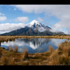 Perfekte Ausblicke auf Mount Taranaki gibt es während der lohnenswerten Wanderung auf dem Pouakai Circuit im Norden des Egmont Nationalparks.