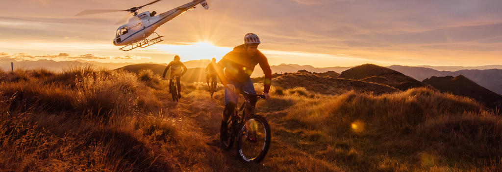 The ultimate Mount Burke mountain bike experience starts with a jaw-dropping helicopter ride high over Lake Wānaka and its surrounding mountains.