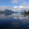 A mirror calm day on Lake Brunner, near Greymouth. Taken from the Arnold River Swing Bridge.