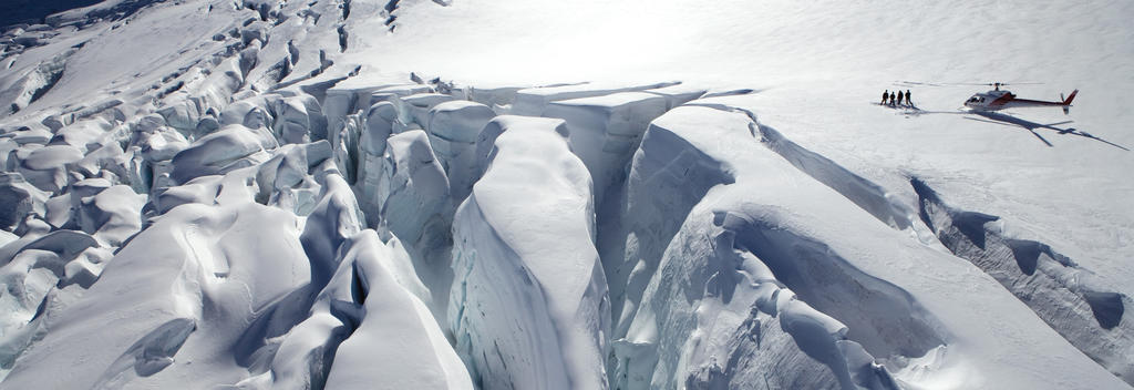 Treat yourself to a scenic helicopter flight, landing high up on a glacier in the Southern Alps.