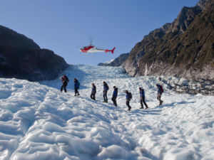 Take a helicopter flight and land on Fox Glacier.