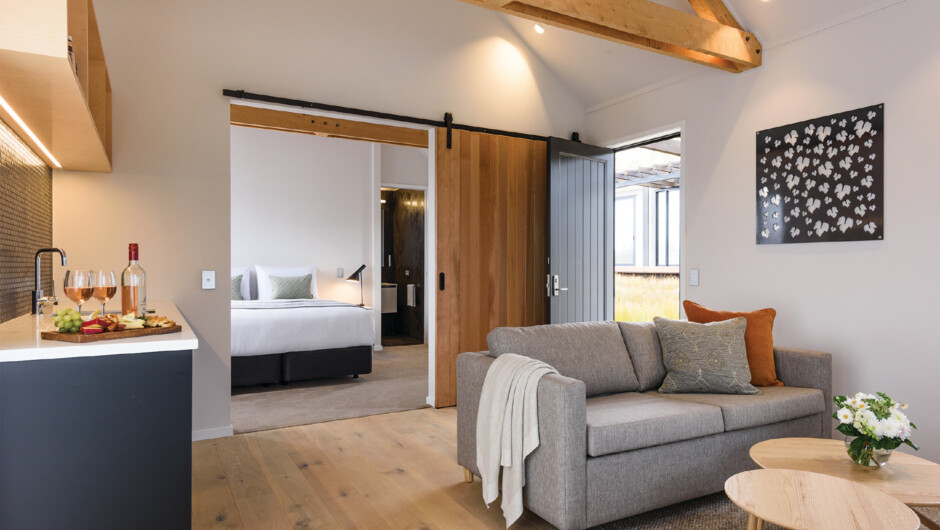 Our Tui suite. 5 luxurious single bedroom villas (circa 40m2) with a king size bed or option for single beds. A fully-equipped en-suite bathroom with heated floors, towel rails and mirrors also features.