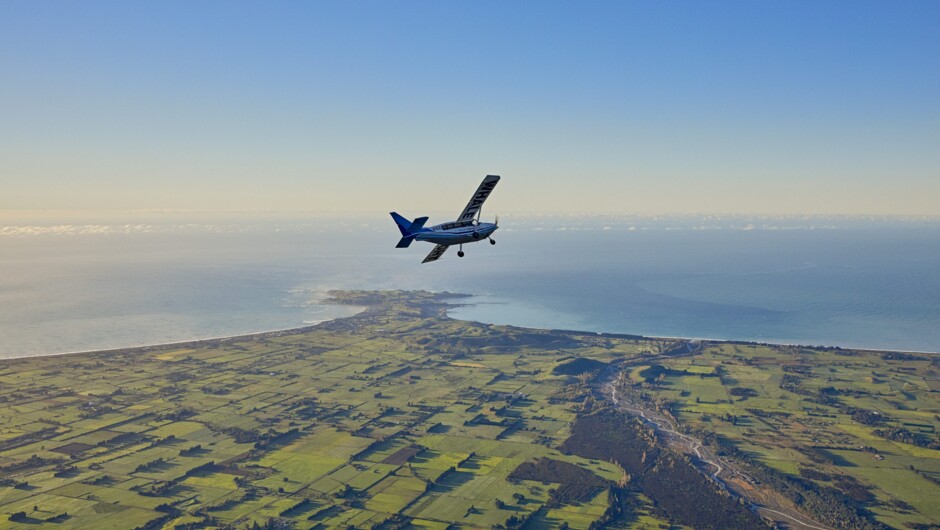 GA8 Airvan flying over the Kaikoura Peninsula