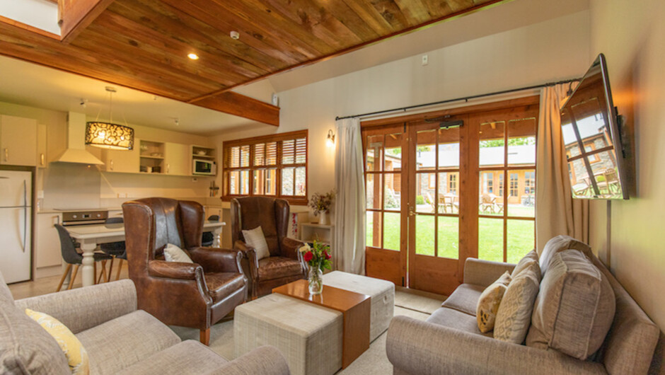 Lismore Cottage Lounge area with doors out to central courtyard