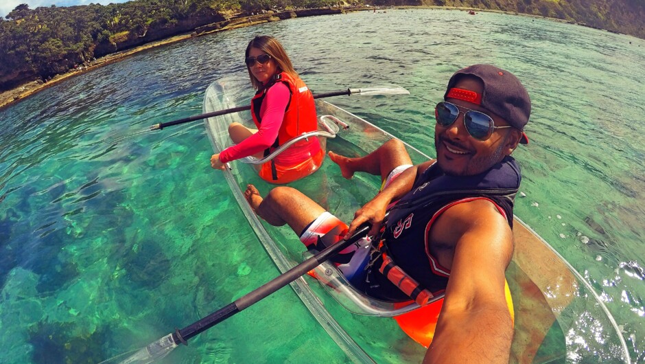 A couple pose for a photo in a Clearyak at Goat Island Marine Reserve