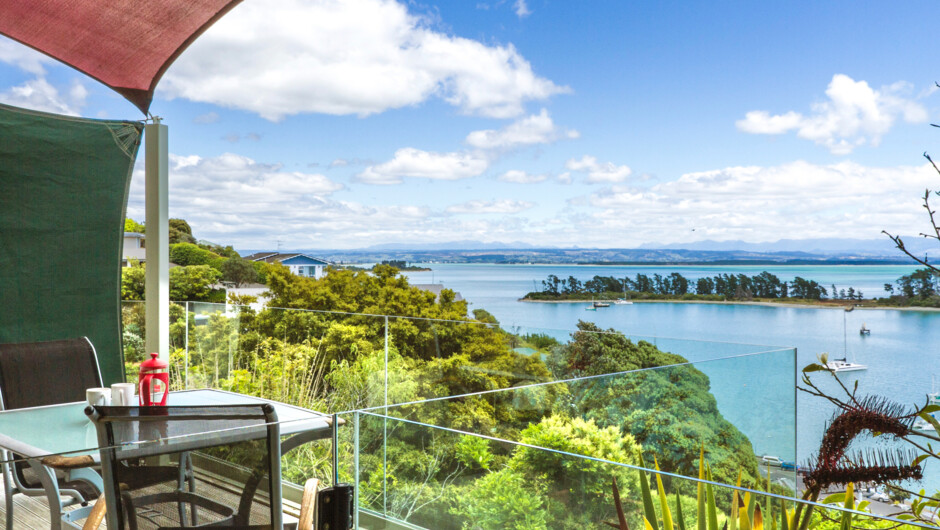 Outdoor dining balcony with seaviews