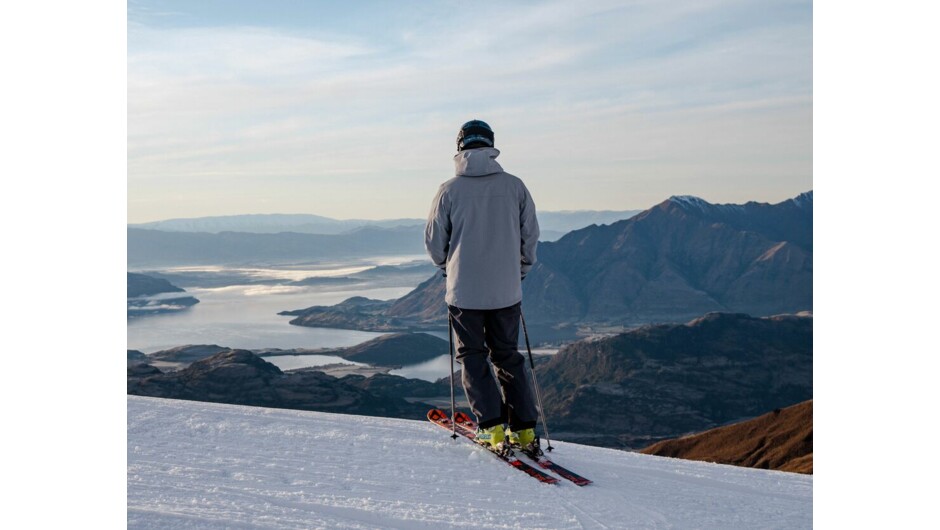 Skier admiring scenery at Treble Cone, Wanaka | Mountainwatch Travel