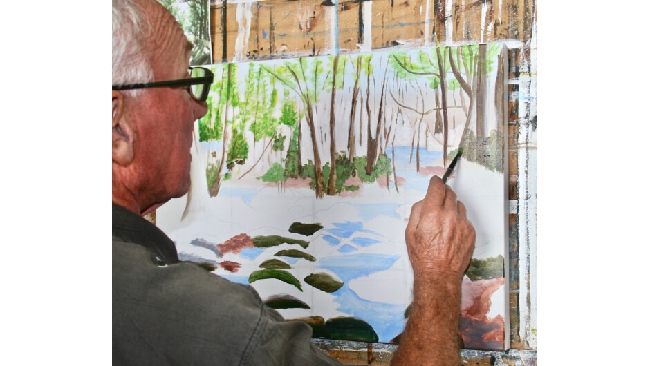 Committee Chairperson Graham demonstrates his landscape painting technique for crowds at the Manawatu Art Expo