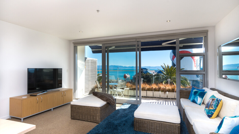 Comfortable living with a great seaside feel with Full Smart TV with Neon & On Demand TV.