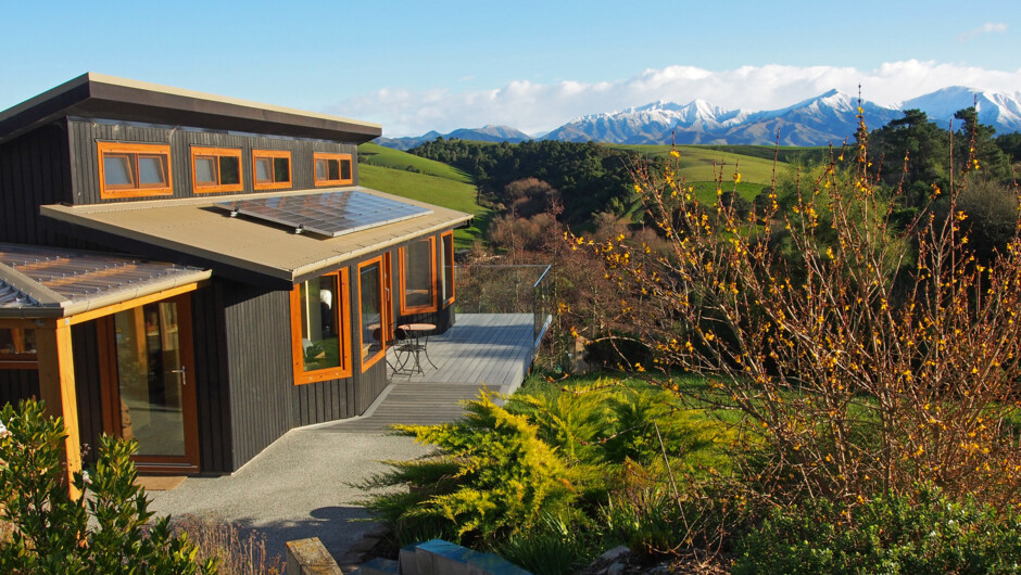 A snow dusting on the Four Peaks to the West but still warm at Kotare BandB overnight thanks to passive-solar design and heat pump.