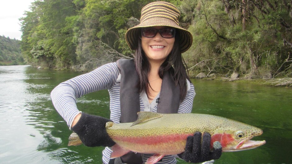 A beautiful wild rainbow trout from the Upper Waiau River, Fiordland National Park