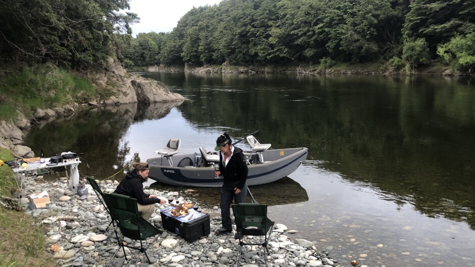 Dinner beside the river before the evening rise starts on one of our Edge of Fiordland Float Trips.