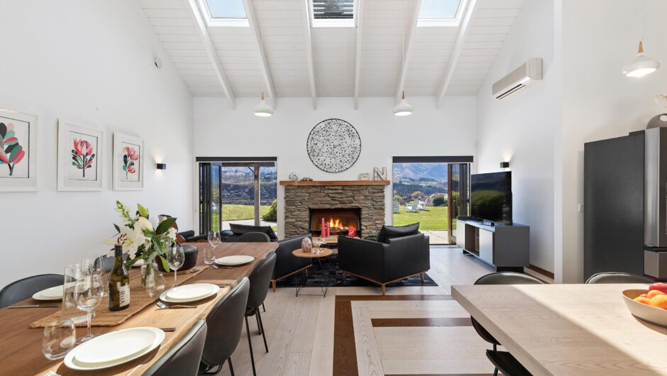 Open-plan living area with fireplace.