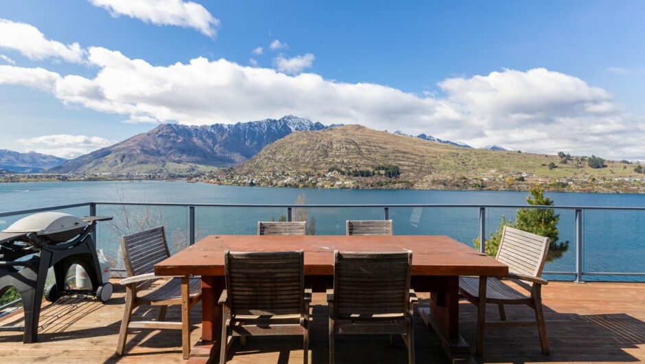 Private balcony with outdoor dining including a BBQ.