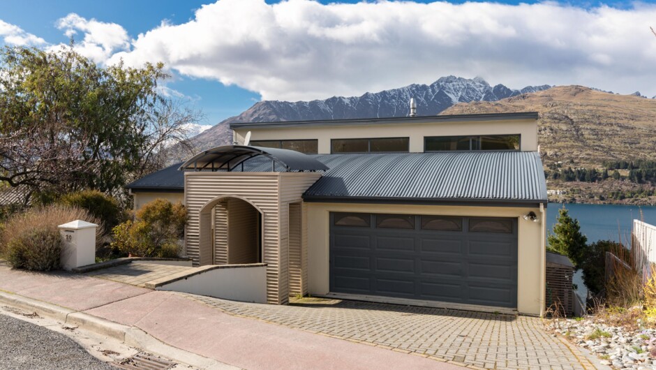 Front exterior with access to the double garage.