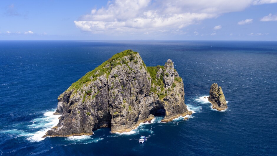 Fullers Bay of Islands boat by the Hole in the Rock