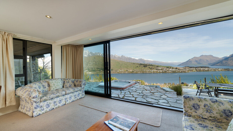 Downstairs living open out to the spa pool