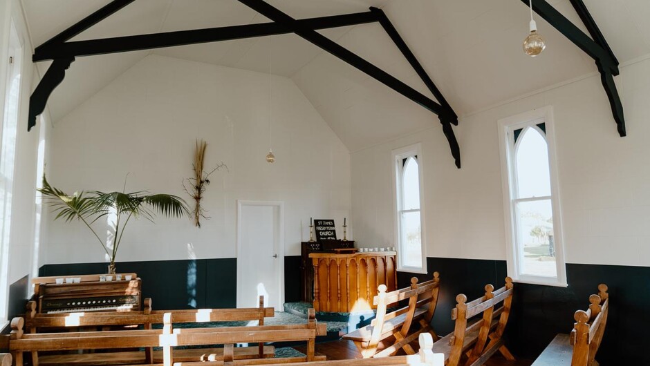 The inside of the church which holds weddings and music events.