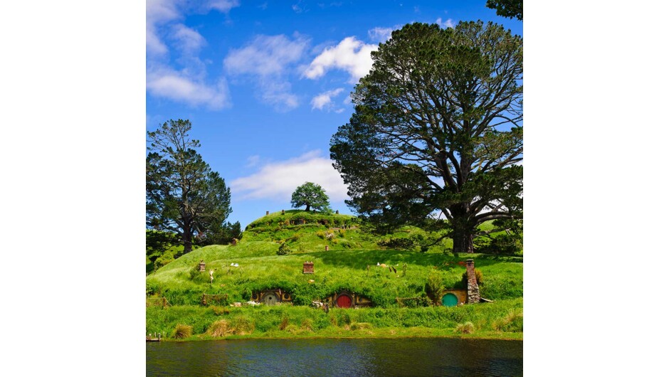 Hobbiton: At this stunning location you can take a photo at the door of Bilbo's house, Bag End, looking out over the whole set to the hills in the distance.