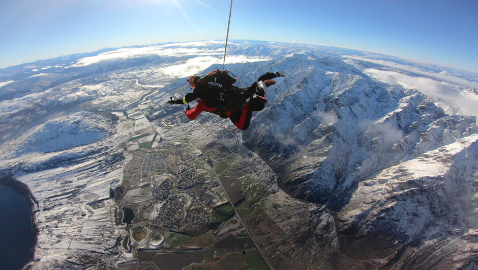 Skydiving in winter over Queenstown.