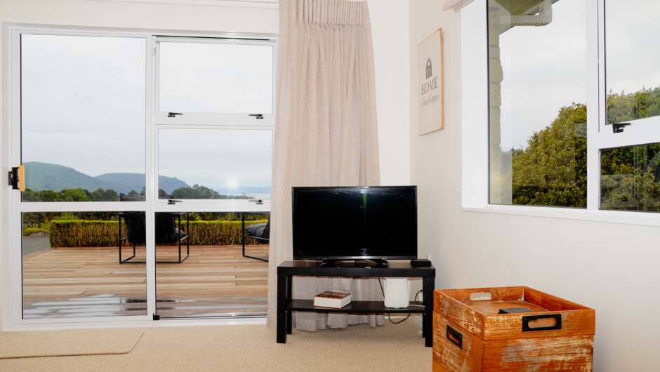 Looking from the lounge to the deck and view beyond.