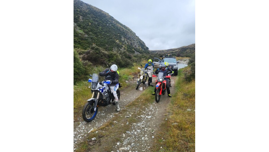 Waiting for some riders at another river crossing.