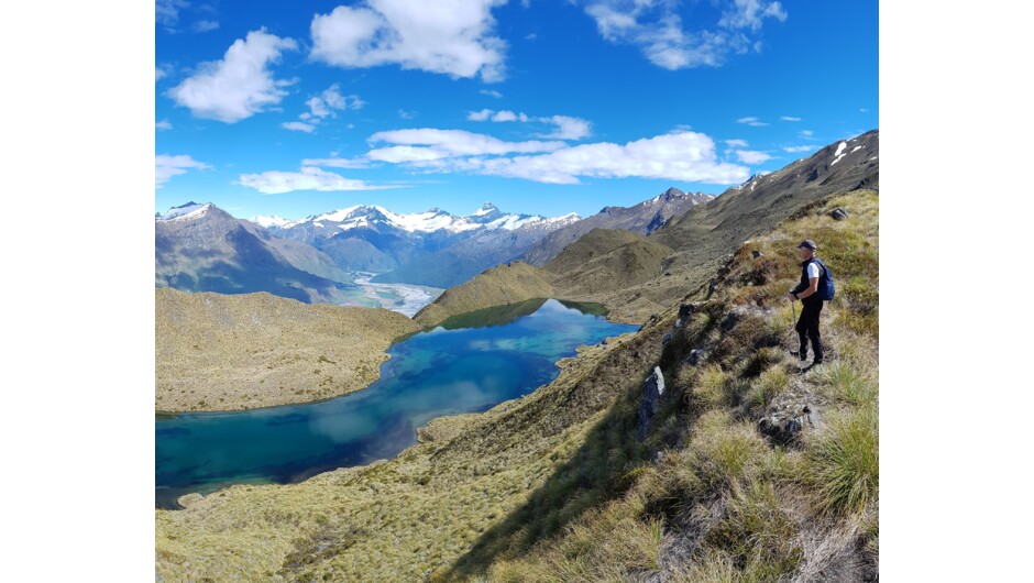 Hike up to view the spectacular lakes with Mt Aspiring in the distance.