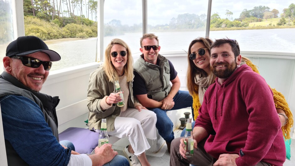 Guests enjoying a drink at the back of the Riverhead Ferry.