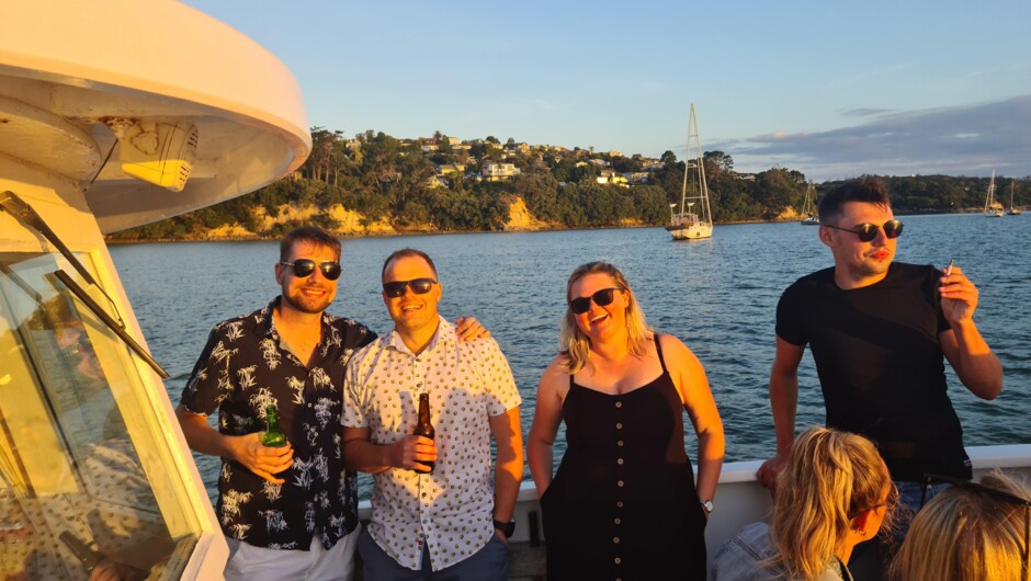 Guests enjoying the front of the boat and views.