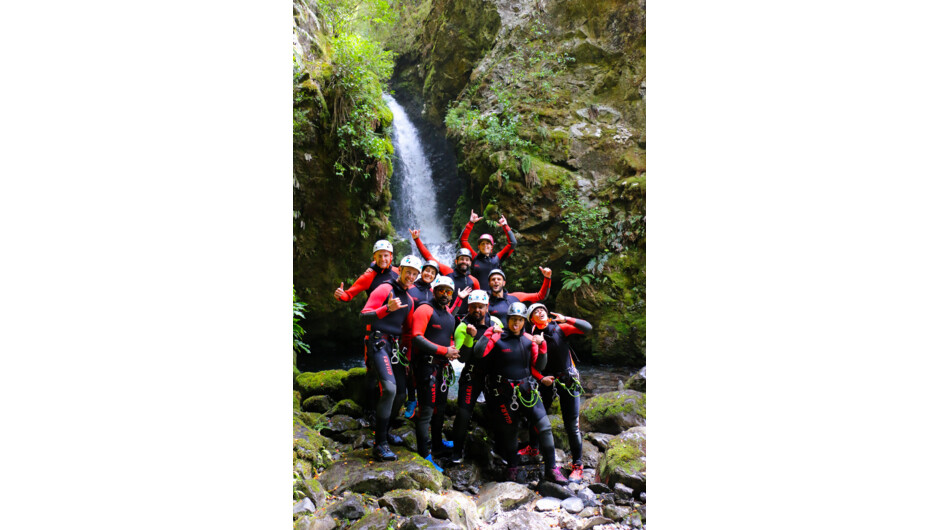 Happy group into hidden falls