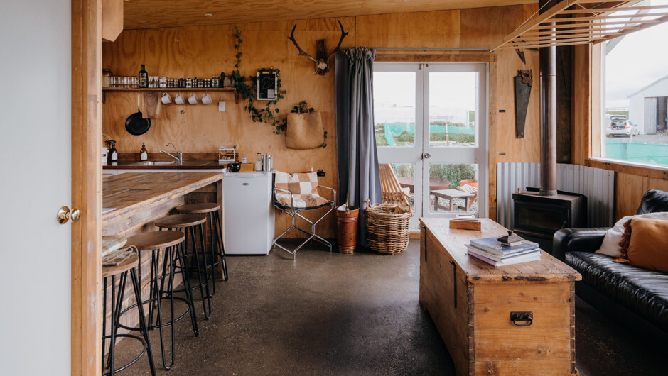 Keep warm and cozy in winter next to the logburner, which can be dampened right down to keep you warm through the night. Ample kindling and firewood located in the woodshed.