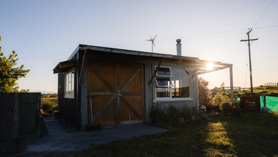 Kawakawa Hut is situated on our farm where we are eagerly learning how to raise our own stock and grow Veges. The hut is situated adjacent the vegetable garden and the barn which is really the hub for our homesteading activities.