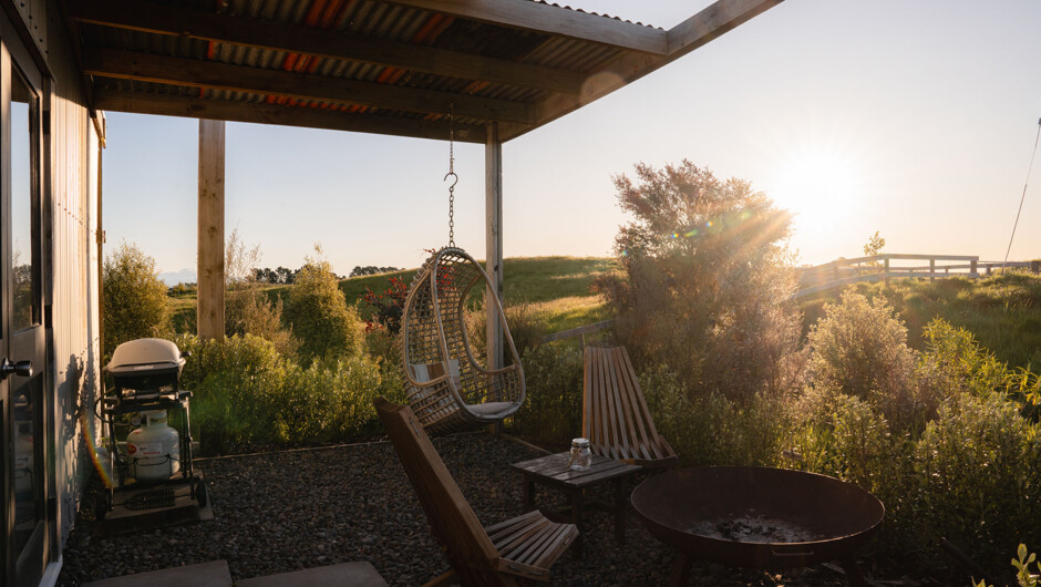 Ideal for enjoying long afternoons, epic western sunsets and starry nights, with a fire pit, outdoor seating & table, BBQ and a pergola.