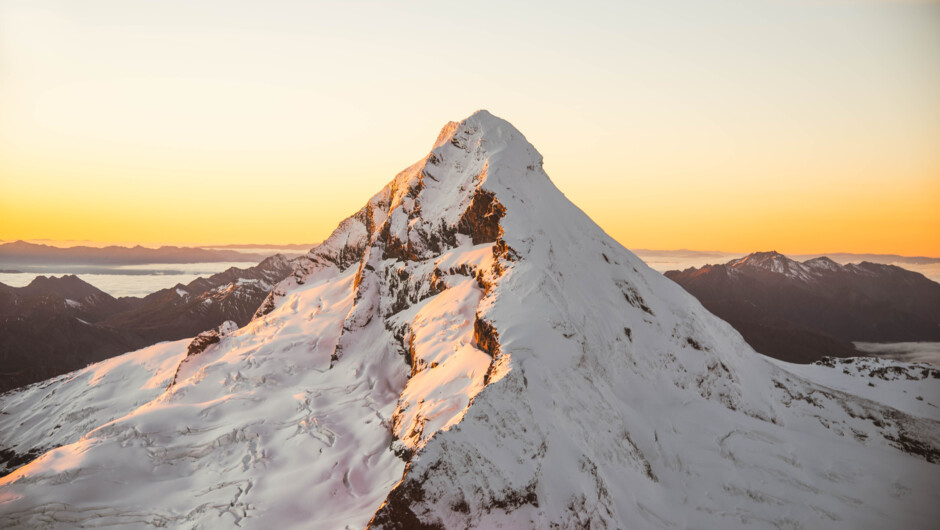 Mt. Aspiring as the sun peaks over the horizon