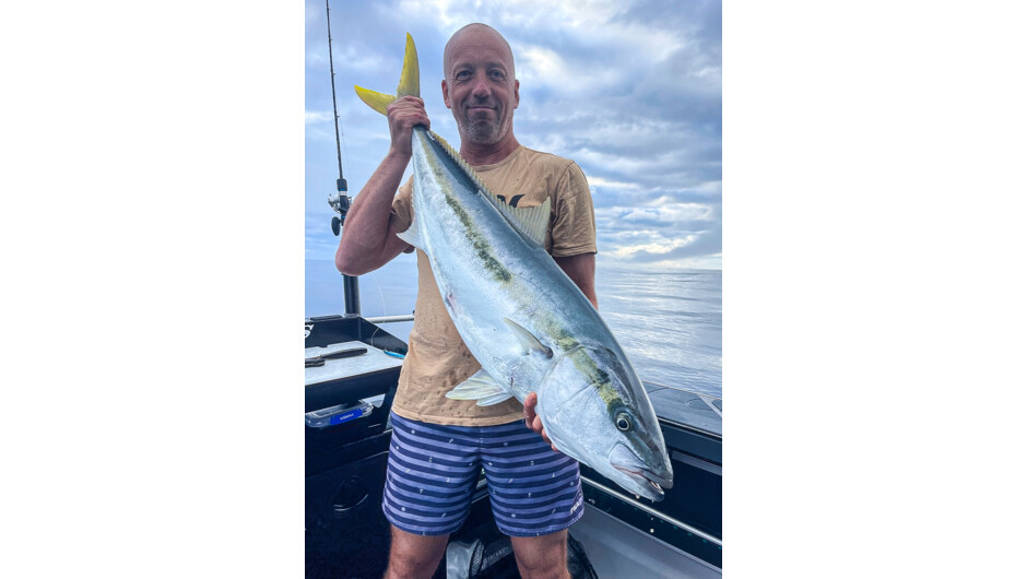 Happy customer with his yellowtail kingfish