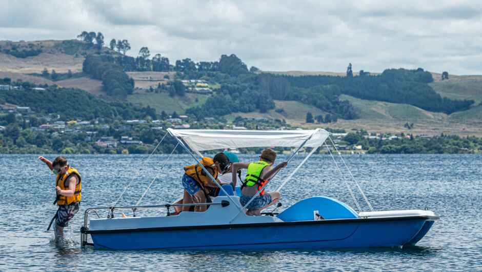 You can jump off the back of our sheltered four person pedal boats and climb up the ladder.