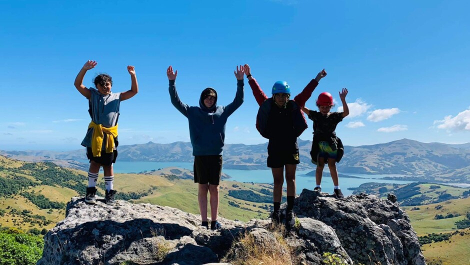 Whole family adventure enjoying a day out above Akaroa, preparing for Rock climbing and Abseiling.