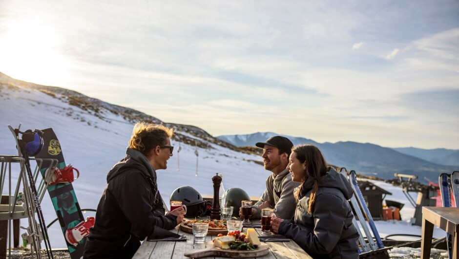 Coronet Peak - ski Queenstown - group of people eating