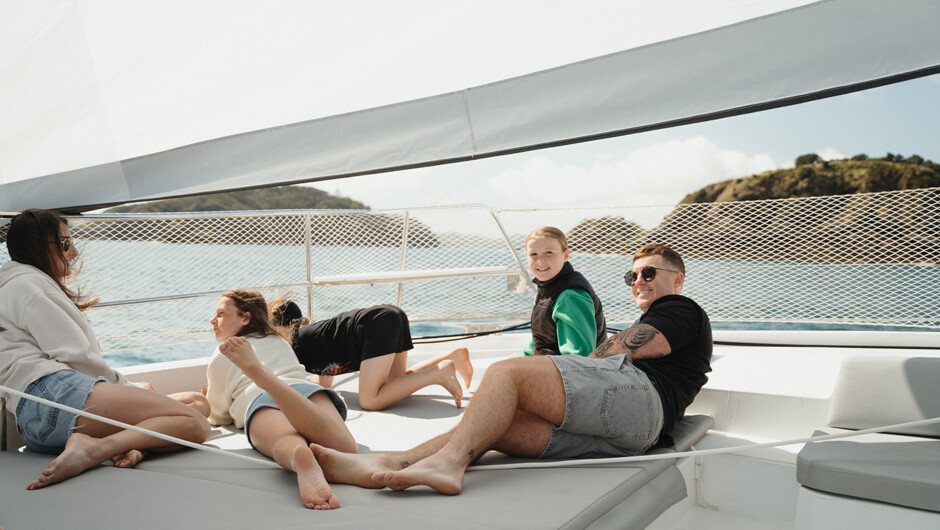 The enormous foredeck lounge has space for the whole family to spread out in comfort.