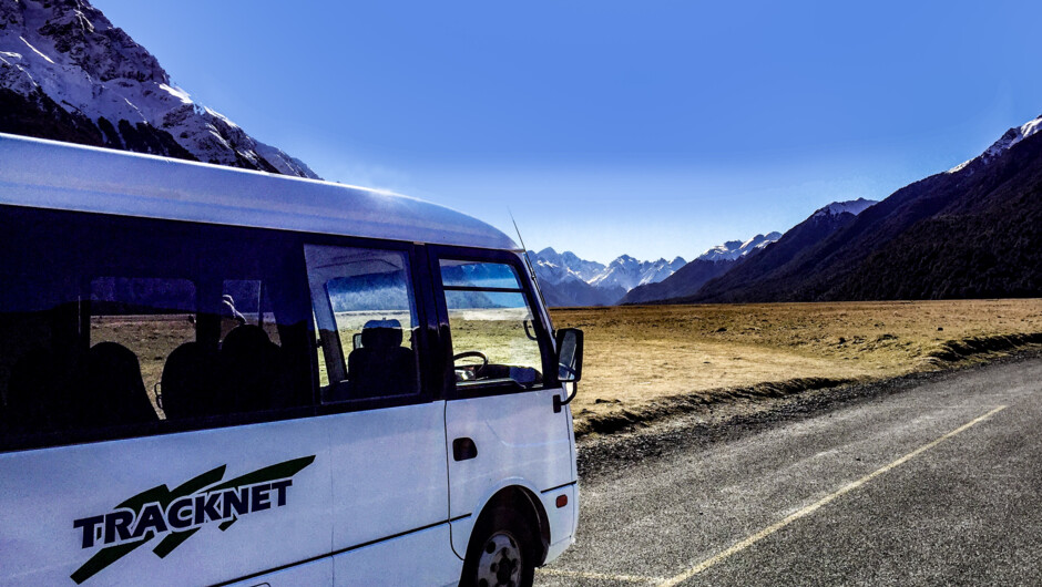 Bus at Eglington Valley, heading towards Milford Sound and Routeburn Track Divide end